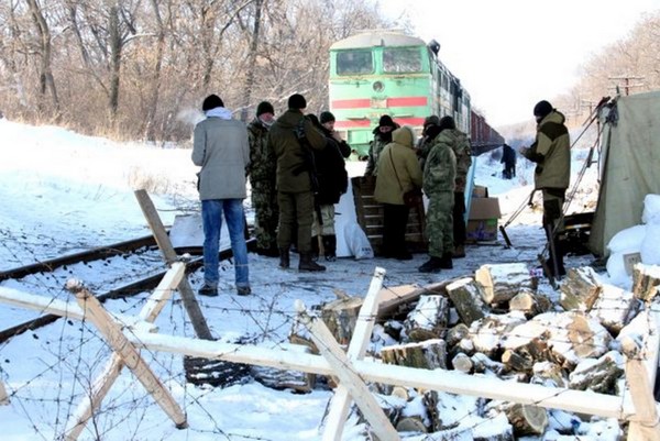 Больше всего с боевиками торгует олигарх Ринат Ахметов